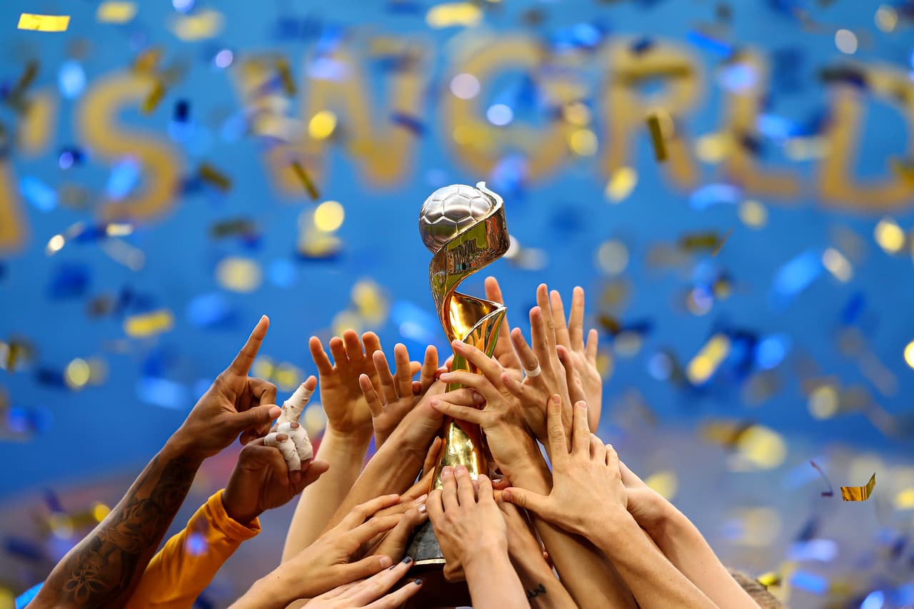 LYON, FRANCE - JULY 07: USA lift the trophy after victory in the 2019 FIFA Women's World Cup France Final match between The United State of America and The Netherlands at Stade de Lyon on July 07, 2019 in Lyon, France. (Photo by Richard Heathcote/Getty Images)