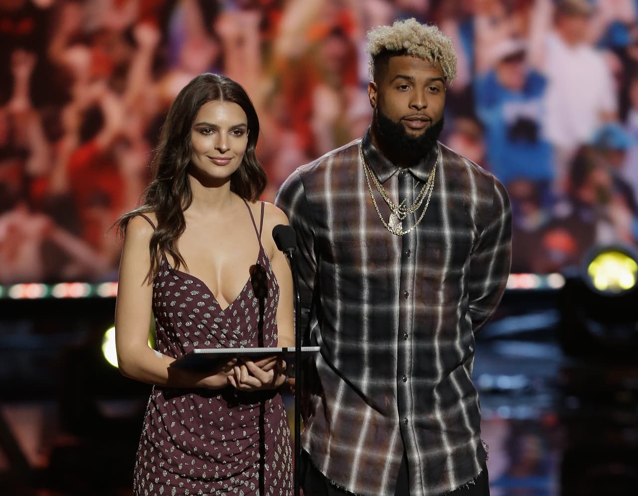 HOUSTON, TX - FEBRUARY 04: Emily Ratajkowski and Odell Beckham Jr. of the New York Giants present the present the AP Offensive Rookie of the Year to quarterback Dak Prescott of the Dallas Cowboys during the NFL Honors at the Wortham Theater Center on February 4, 2017 in Houston, Texas. (Photo by Bob Levey/Getty Images)