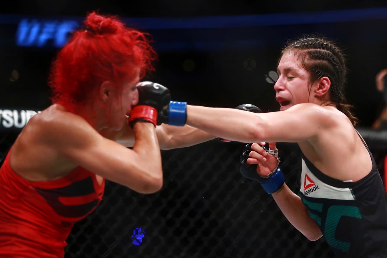 MEXICO CITY, MEXICO - AUGUST 05: Alexa Grasso of Mexico punches Randa Markos of Canada during the UFC Fight Night Mexico City at Arena Ciudad de Mexico on August 05, 2017 in Mexico City, Mexico. (Photo by Hector Vivas/Getty Images)