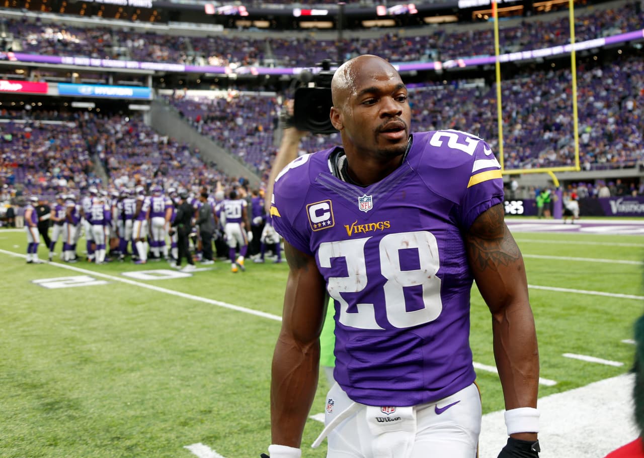 Minnesota Vikings running back Adrian Peterson warms up before the start of an NFL football game between the Indianapolis Colts and the Minnesota Vikings Sunday, Dec. 18, 2016, in Minneapolis. (AP Photo/Andy Clayton-King)