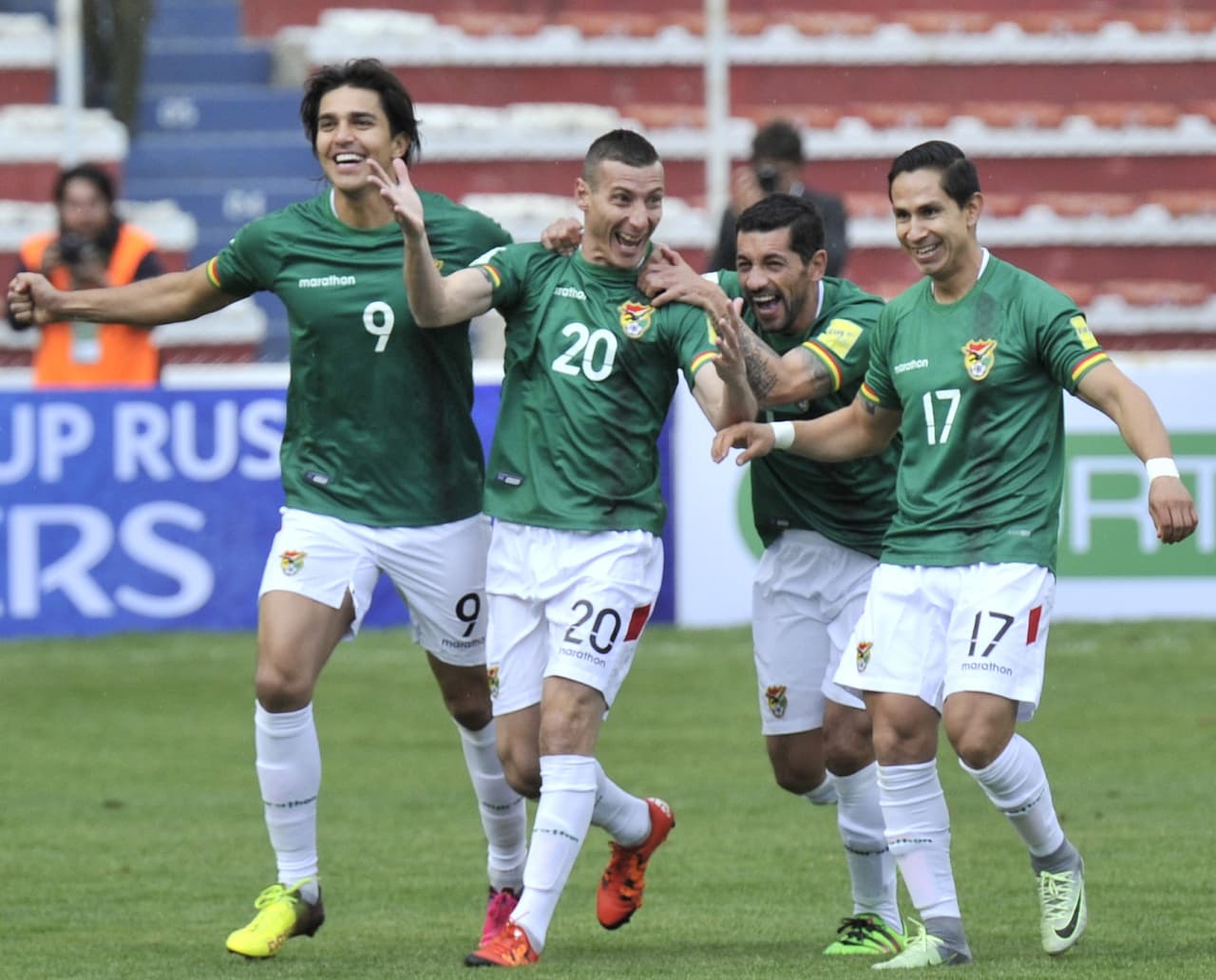 Bolivia's Pablo Escobar (2nd L) celebrates with (L to R) Marcelo Martins, Walter Flores and Marvin Bejarano after scoring against Ecuador during their Russia 2018 FIFA World Cup qualifier football match in La Paz, on October 11, 2016. / AFP / AIZAR RALDES (Photo credit should read AIZAR RALDES/AFP/Getty Images)