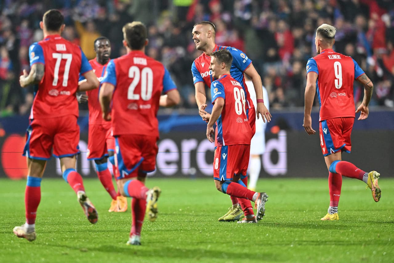 Viktoria Plzen's Czech midfielder Adam Vlkanova (2nd R) celebrates scoring the 1-4 goal with his team-mates during the UEFA Champions League Group C football match between FC Viktoria Plzen and FC Bayern Munich in Plzen, Czech Republic, on October 12, 2022. (Photo by Joe Klamar / AFP) (Photo by JOE KLAMAR/AFP via Getty Images)