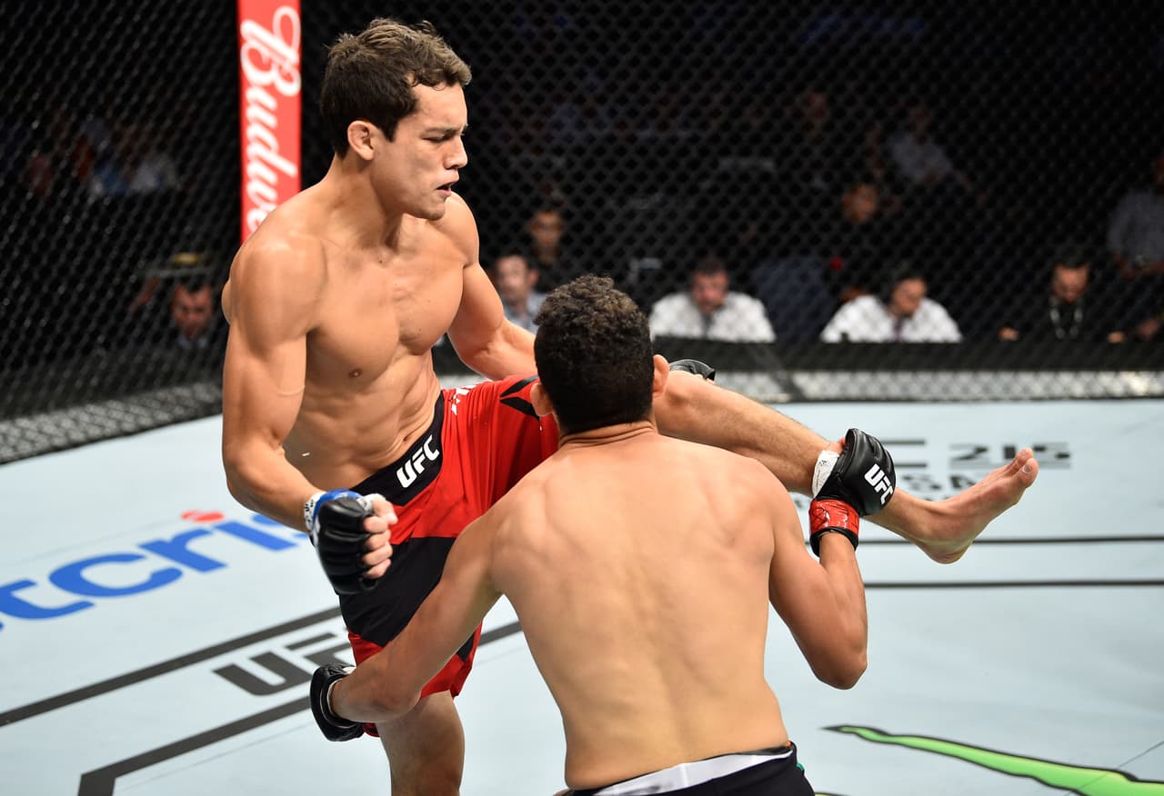 MEXICO CITY, MEXICO - AUGUST 05: (L-R) Humberto Bandenay of Peru knees Martin Bravo of Mexico in their lightweight bout during the UFC Fight Night event at Arena Ciudad de Mexico on August 5, 2017 in Mexico City, Mexico. (Photo by Jeff Bottari/Zuffa LLC/Zuffa LLC via Getty Images)