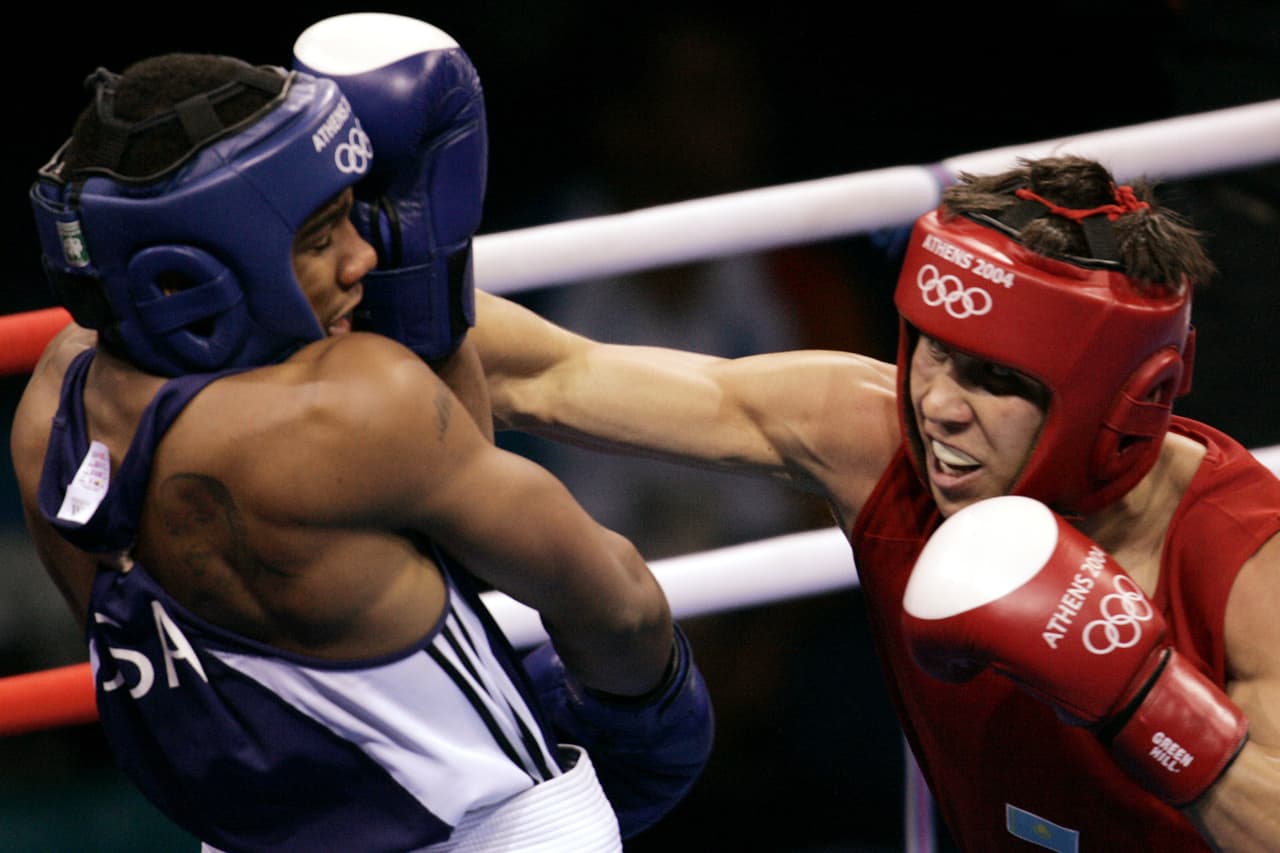 Ambos se deberían enfrentar para representar a su país en los JJOO de 2004. En casa decidieron que Gennady, por ser 15 minutos mayor que su gemelo, asistiera a la justa olímpica.