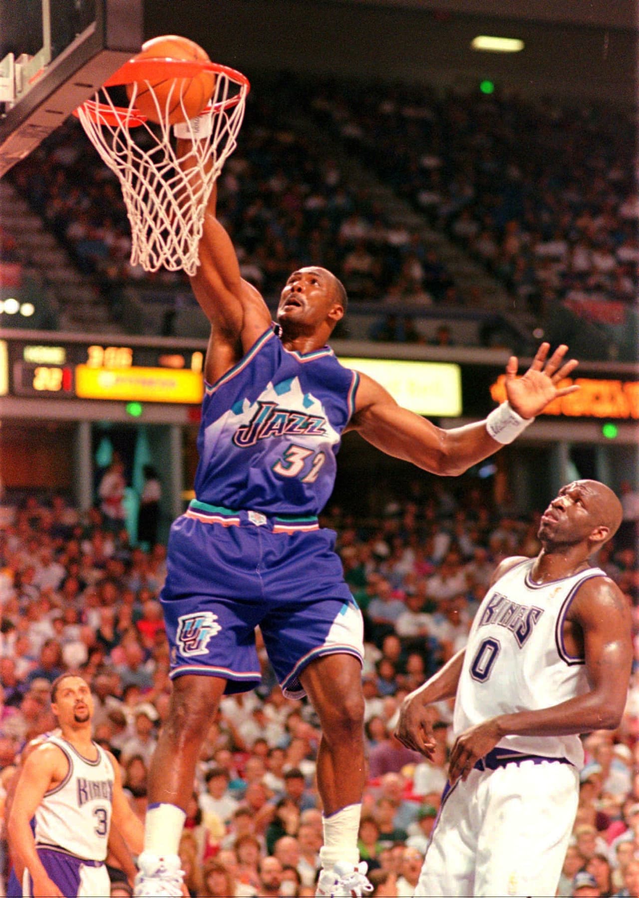 Segundo lugar, Karl Malone con 36,298 puntos.