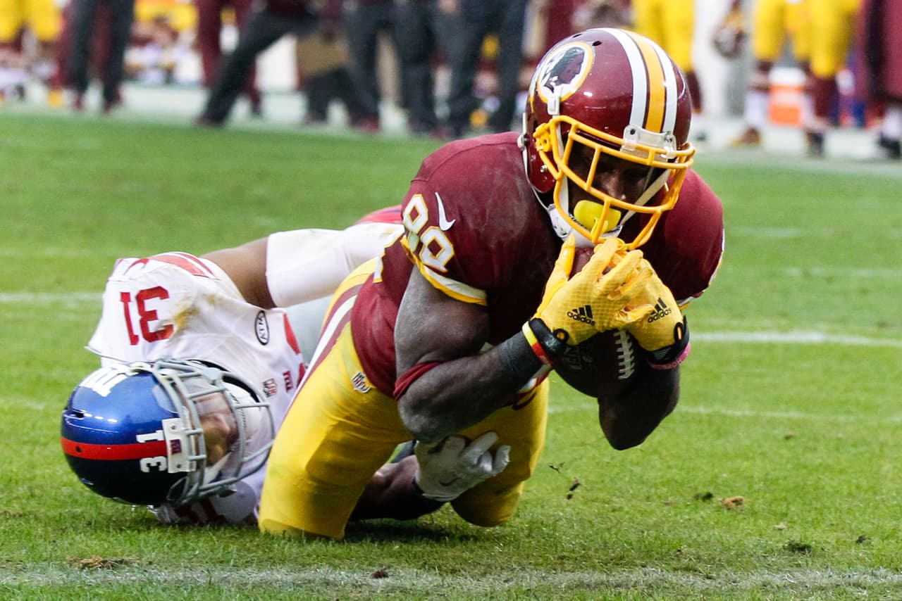 Los Washington Redskins empataron a los New York Giants al tope del Este de la NFC al vencerlos 20-14 en la semana 12, estas son las mejores imágenes de este reñido encuentro.