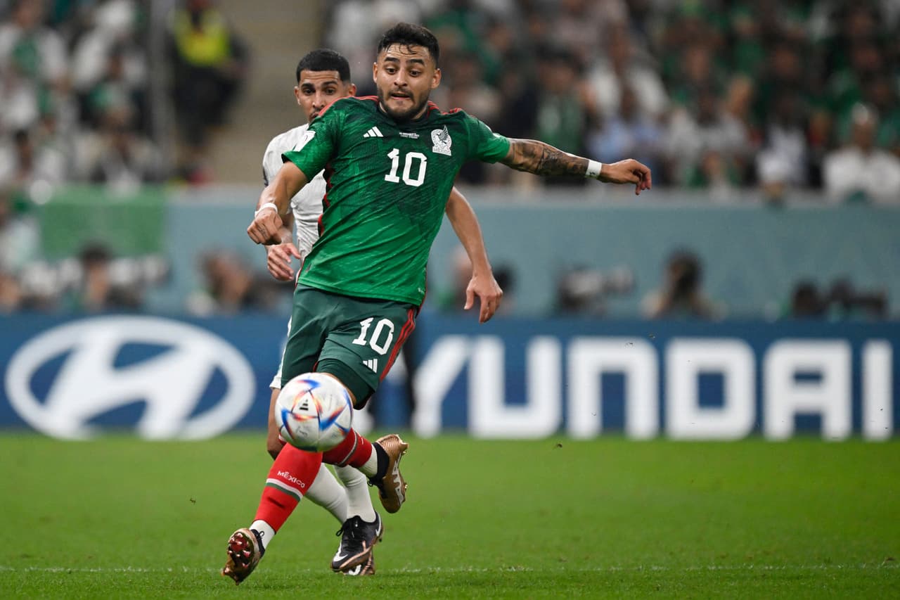 Mexico's forward #10 Alexis Vega runs with the ball during the Qatar 2022 World Cup Group C football match between Saudi Arabia and Mexico at the Lusail Stadium in Lusail, north of Doha on November 30, 2022. (Photo by Alfredo ESTRELLA / AFP) (Photo by ALFREDO ESTRELLA/AFP via Getty Images)