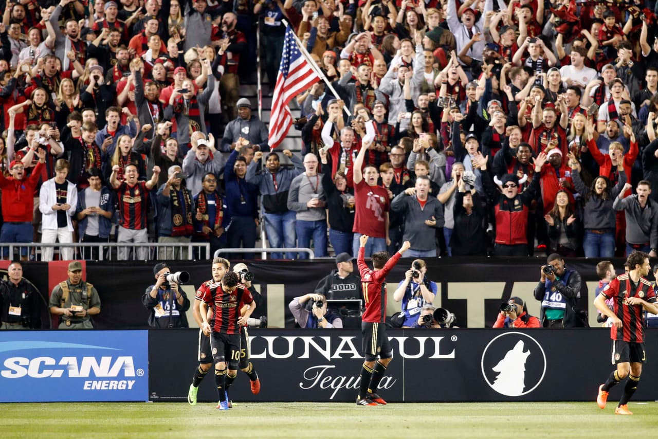 Mar 5, 2017; Atlanta, GA, USA; Atlanta United midfielder Yamil Asad (11) celebrates after a goal against the New York Red Bulls in the first half at Bobby Dodd Stadium at Historic Grant Field. Mandatory Credit: Brett Davis-USA TODAY Sports
