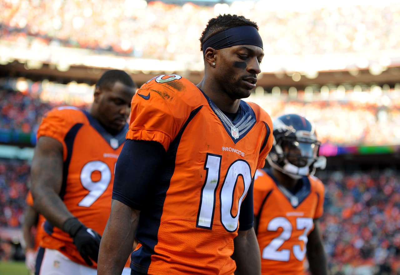 DENVER, CO - JANUARY 17: Emmanuel Sanders #10 of the Denver Broncos walks off the field at the half during the AFC Divisional Playoff Game against the Pittsburgh Steelers at Sports Authority Field at Mile High on January 17, 2016 in Denver, Colorado. (Photo by Dustin Bradford/Getty Images)