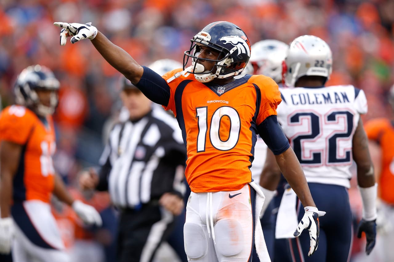 DENVER, CO - JANUARY 24: Emmanuel Sanders #10 of the Denver Broncos reacts after a first down in the second half against the New England Patriots in the AFC Championship game at Sports Authority Field at Mile High on January 24, 2016 in Denver, Colorado. (Photo by Ezra Shaw/Getty Images)
