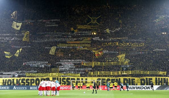 DORTMUND, GERMANY - FEBRUARY 04: Supporters of Dortmund display banners prior to the Bundesliga match between Borussia Dortmund and RB Leipzig at Signal Iduna Park on February 4, 2017 in Dortmund, Germany. (Photo by Lars Baron/Bongarts/Getty Images)