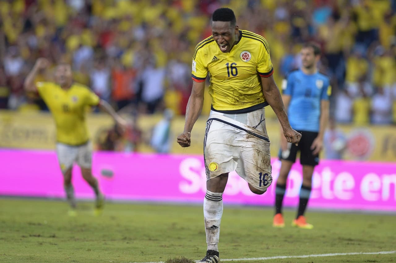 Colombia's defender Yerry Mina celebrates after scoring against Uruguay during their Russia 2018 World Cup qualifier football match in Barranquilla, Colombia, on October 11, 2016. / AFP / Raul Arboleda (Photo credit should read RAUL ARBOLEDA/AFP/Getty Images)