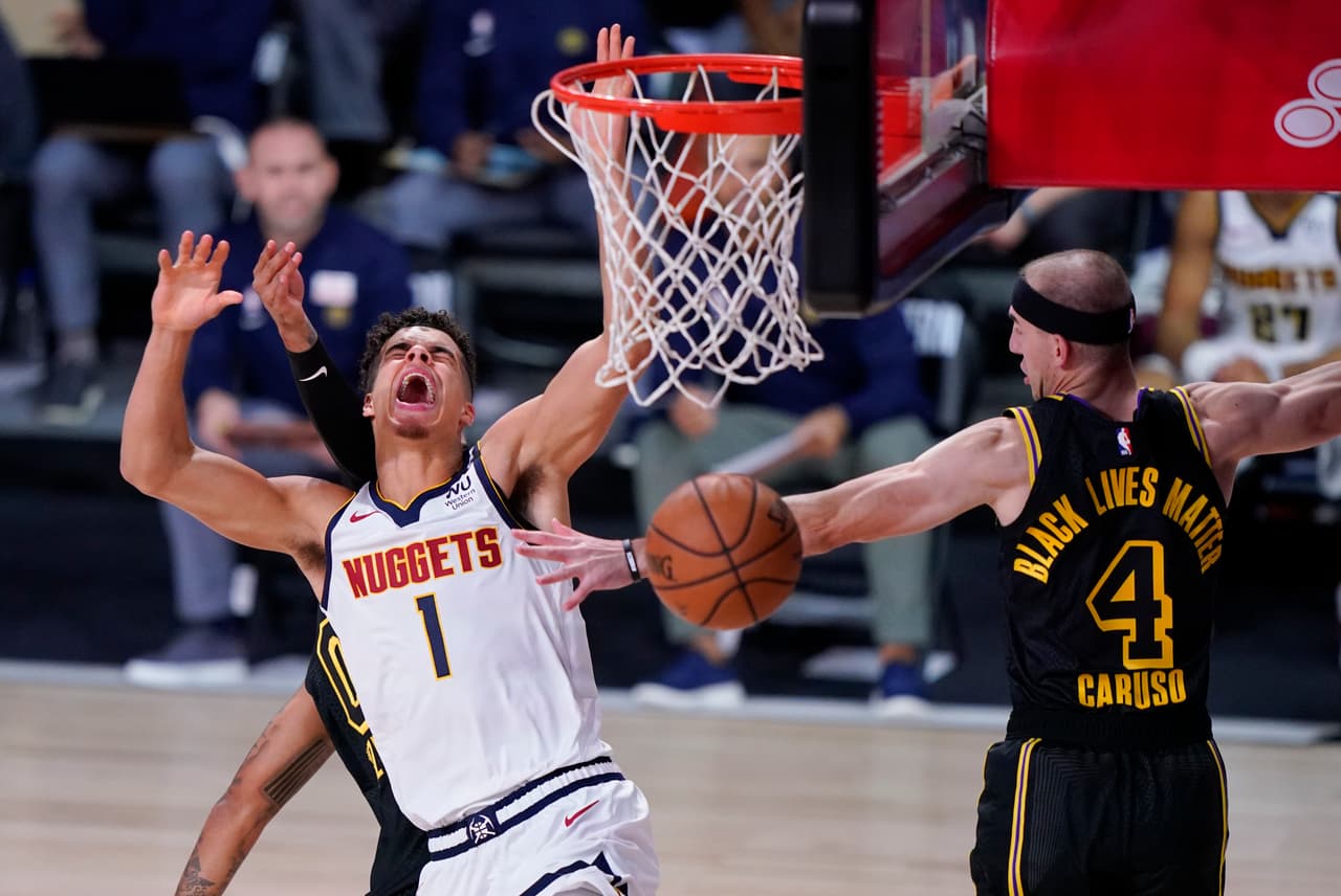 Anthony Davies anota 31 puntos y encesta la canasta que le da el triunfo a los Lakers 103-105 sobre los Denver Nuggets.