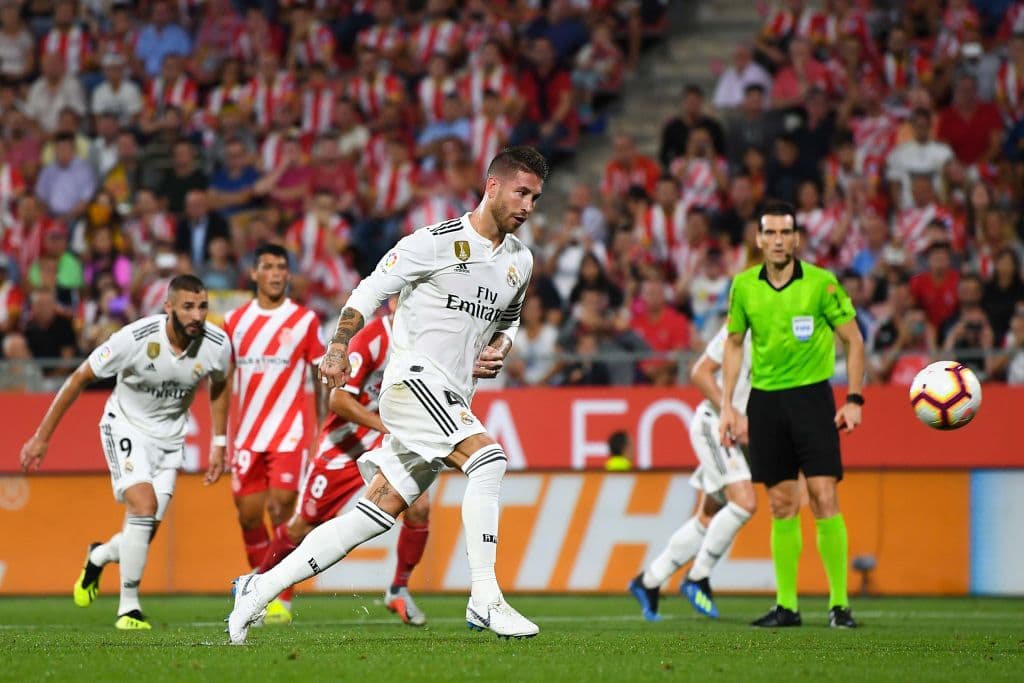 GIRONA, SPAIN - AUGUST 26: Sergio Ramos of Real Madrid CF scores his team's first goal from the penalty spot during the La Liga match between Girona FC and Real Madrid CF at Montilivi Stadium on August 26, 2018 in Girona, Spain. (Photo by David Ramos/Getty Images)