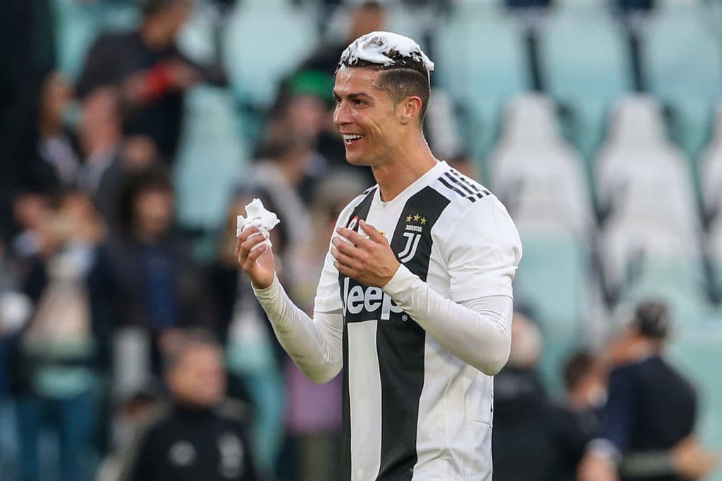 TURIN, ITALY - APRIL 20: Cristiano Ronaldo of Juventus celebrates after winning the Italian league at the end of the Serie A match between Juventus and ACF Fiorentina on April 20, 2019 in Turin, Italy. (Photo by Giampiero Sposito/Getty Images)