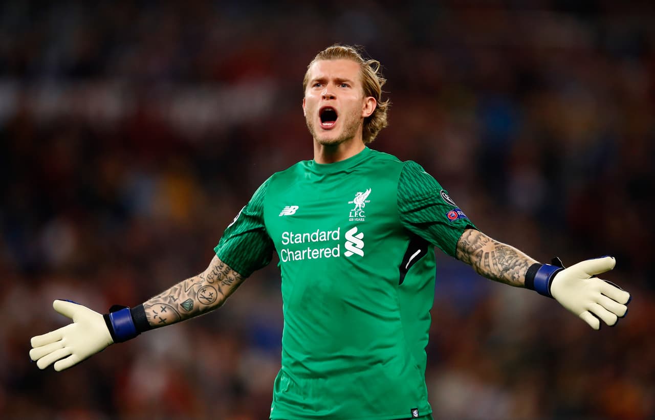 ROME, ITALY - MAY 02: Loris Karius of Liverpool celebrates after his side score their first goal during the UEFA Champions League Semi Final Second Leg match between A.S. Roma and Liverpool at Stadio Olimpico on May 2, 2018 in Rome, Italy. (Photo by Julian Finney/Getty Images)