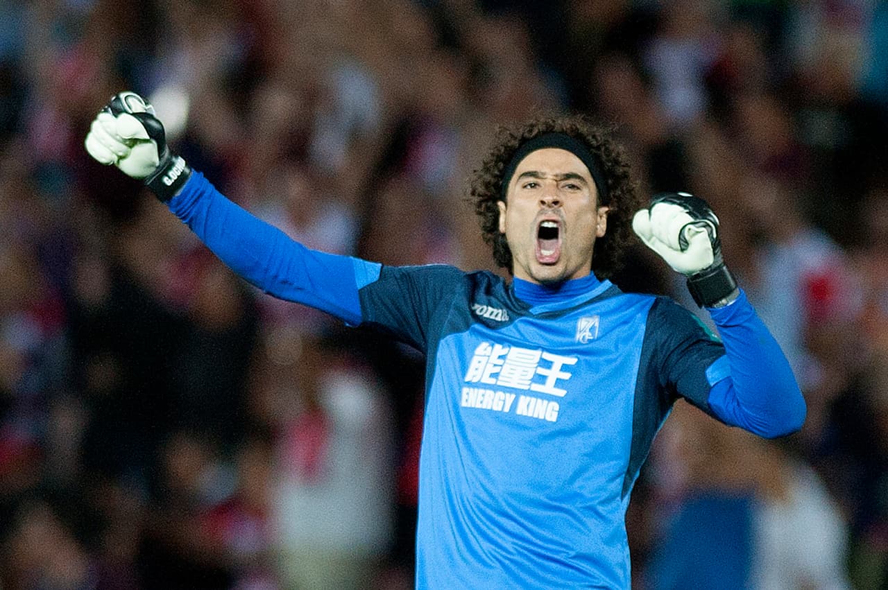 Granada's Mexican goalkeeper Guillermo Ochoa celebrates his team's goal during the Spanish league football match Granada CF vs Athletic Club de Bilbao at Nuevo Los Carmenes stadium in Granada on September 21, 2016. / AFP / JORGE GUERRERO (Photo credit should read JORGE GUERRERO/AFP/Getty Images)
