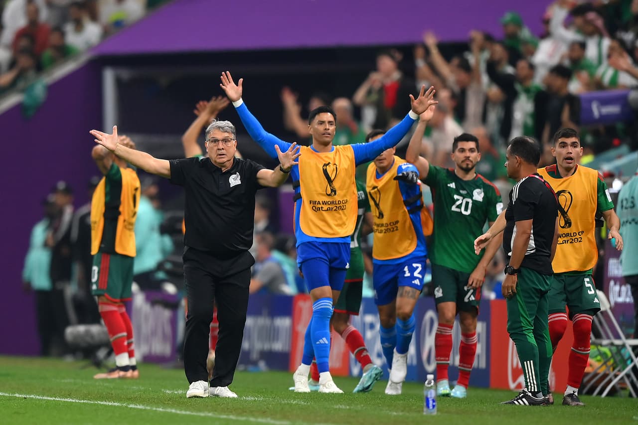LUSAIL CITY, QATAR - NOVEMBER 30: Gerardo Martino, Head Coach of Mexico, reacts with the team bench during the FIFA World Cup Qatar 2022 Group C match between Saudi Arabia and Mexico at Lusail Stadium on November 30, 2022 in Lusail City, Qatar. (Photo by Justin Setterfield/Getty Images)