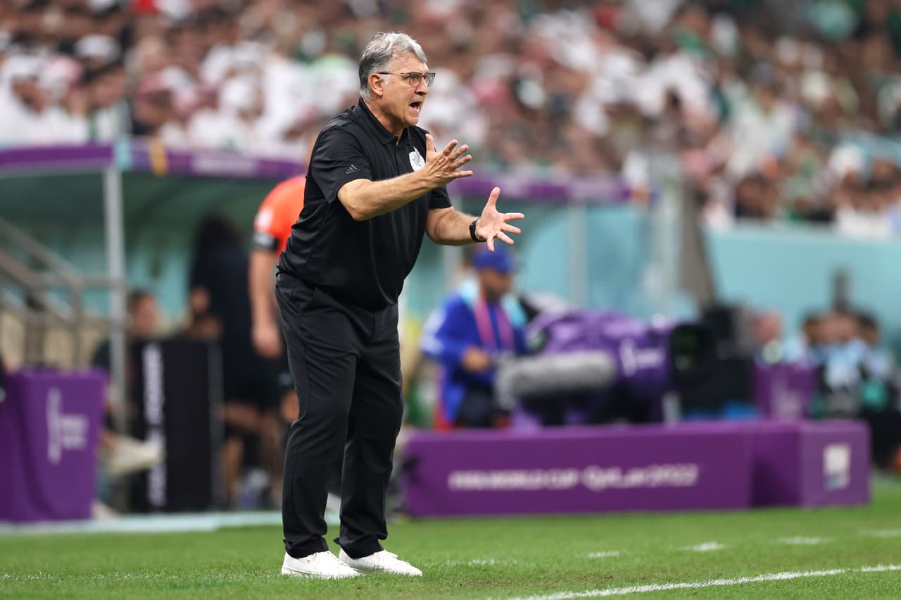 LUSAIL CITY, QATAR - NOVEMBER 30: Gerardo Martino, Head Coach of Mexico, gives their team instructions during the FIFA World Cup Qatar 2022 Group C match between Saudi Arabia and Mexico at Lusail Stadium on November 30, 2022 in Lusail City, Qatar. (Photo by Michael Steele/Getty Images)