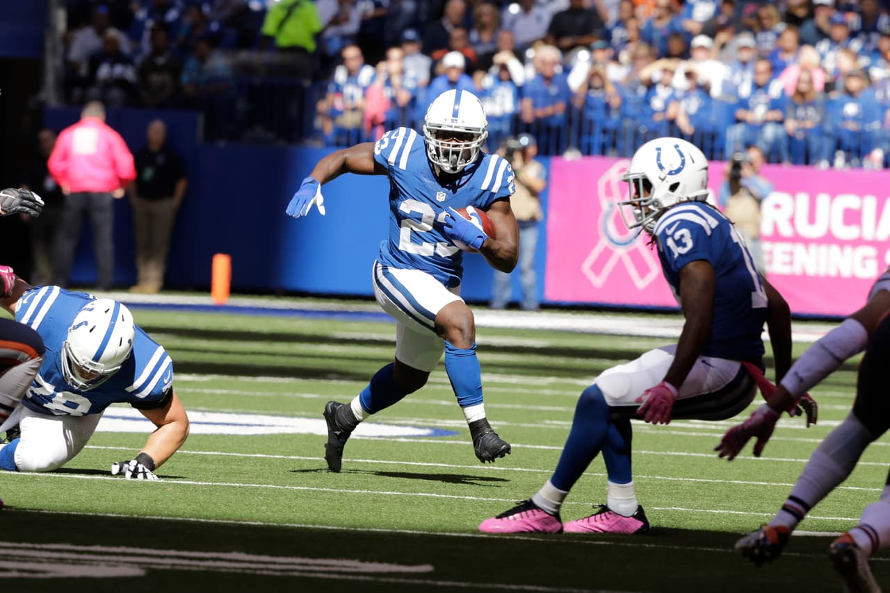 Indianapolis Colts running back Frank Gore (23) runs against the Chicago Bears during the first half of an NFL football game in Indianapolis, Sunday, Oct. 9, 2016. (AP Photo/Darron Cummings)