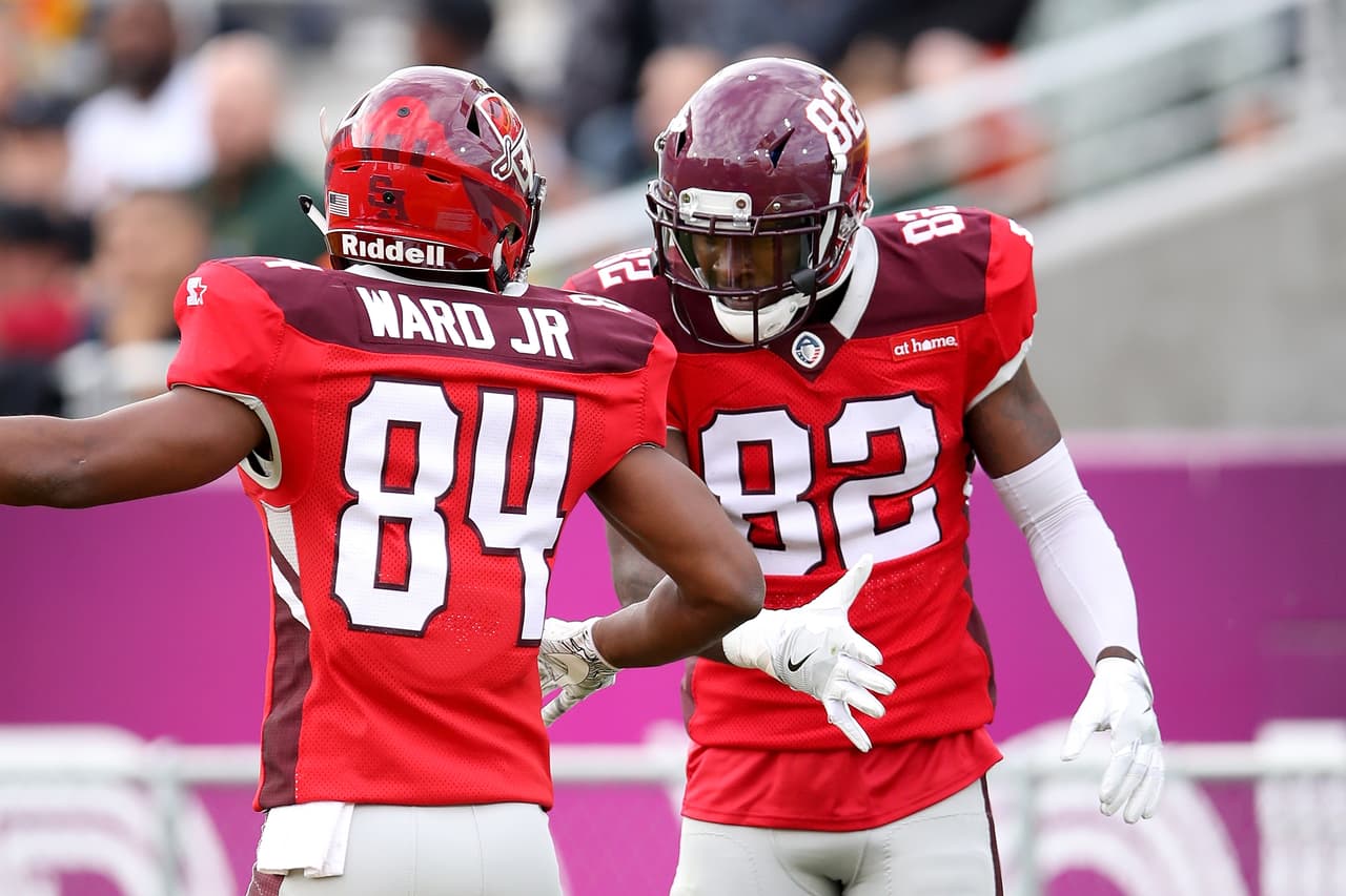 Greg Ward Jr. #84 and Mekale McKay #82 of the San Antonio Commanders celebrate after McKay scored a touchdown in the first quarter against the Arizona Hotshots during the Alliance of American Football game at Sun Devil Stadium on March 10, 2019 in Tempe, Arizona.