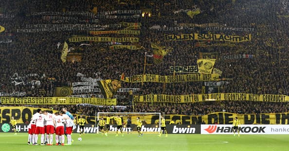 DORTMUND, GERMANY - FEBRUARY 04: Supporters of Dortmund display banners prior to the Bundesliga match between Borussia Dortmund and RB Leipzig at Signal Iduna Park on February 4, 2017 in Dortmund, Germany. (Photo by Lars Baron/Bongarts/Getty Images)