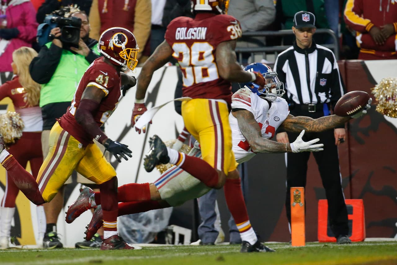 Los Washington Redskins empataron a los New York Giants al tope del Este de la NFC al vencerlos 20-14 en la semana 12, estas son las mejores imágenes de este reñido encuentro.