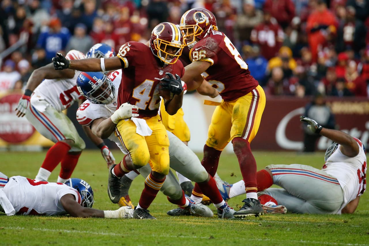 Los Washington Redskins empataron a los New York Giants al tope del Este de la NFC al vencerlos 20-14 en la semana 12, estas son las mejores imágenes de este reñido encuentro.
