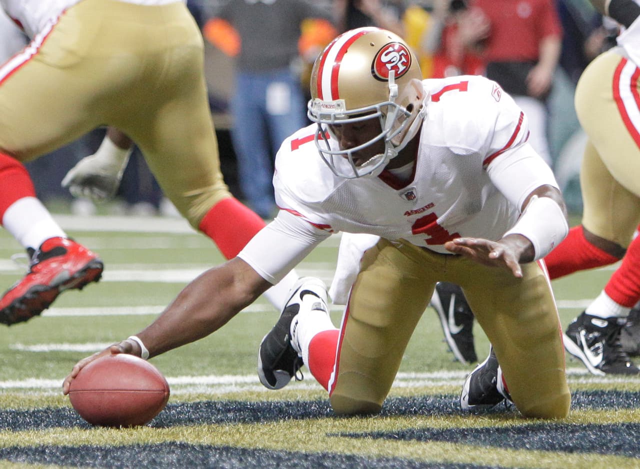 Troy Smith (2006 con Ohio State) - Smith partició en solo 20 juegos, siendo titular en ocho, para los Baltimore Ravens y los San Francisco 49ers en cuatro temporadas en la NFL.