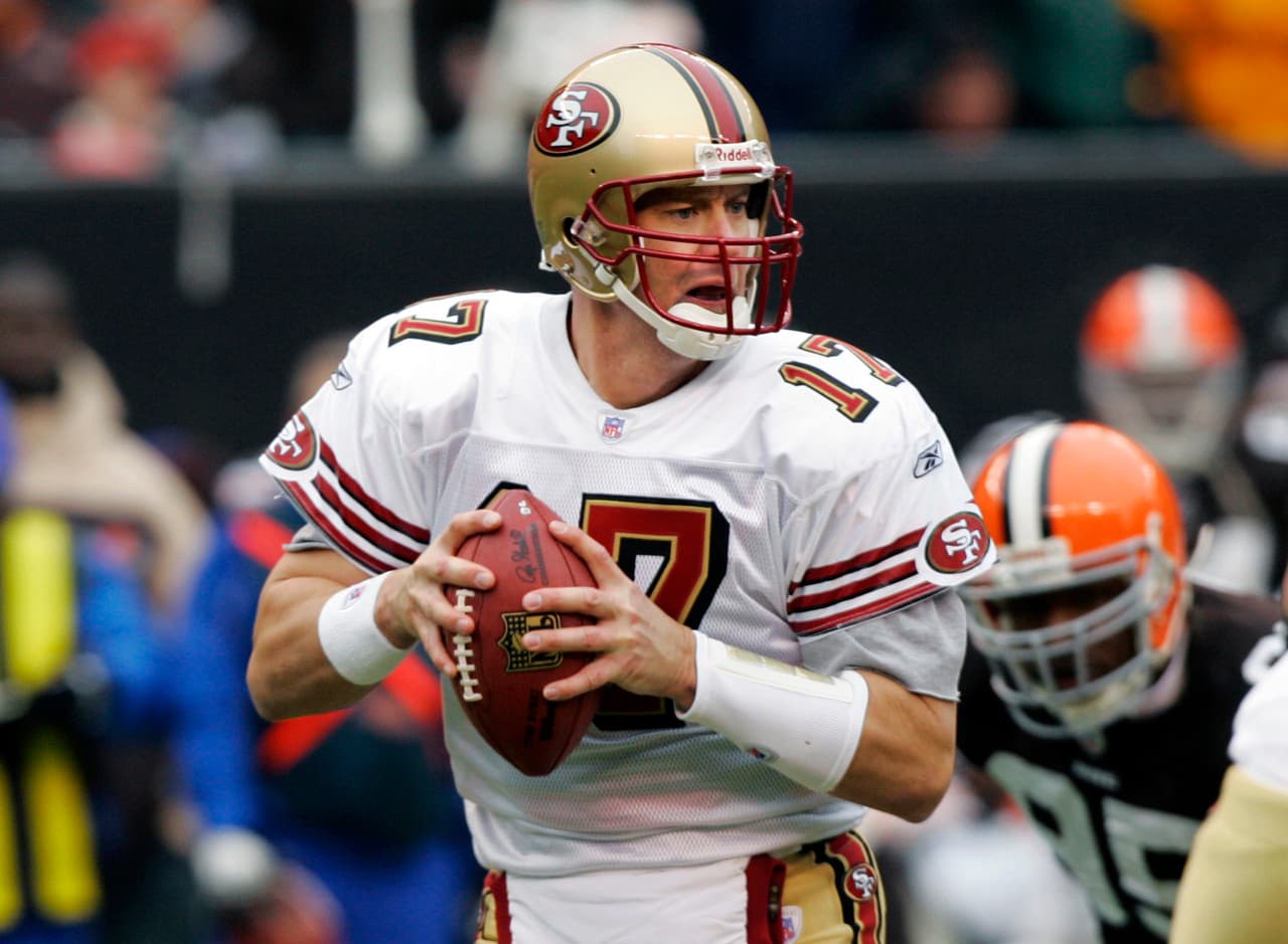 Chris Weinke (2000 con Florida State) - Weinke fue el quarterback titular para los Carolina Panthers en 2001, ganó el primer juego en la campaña y perdió los siguientes 15 para una marca de 1-15. Tras esa temporada, Weinke fue reserva de los Panthers por cinco años y en 2007 en la banca de los 49ers, siendo titular en la última semana y perdiendo con los Browns.