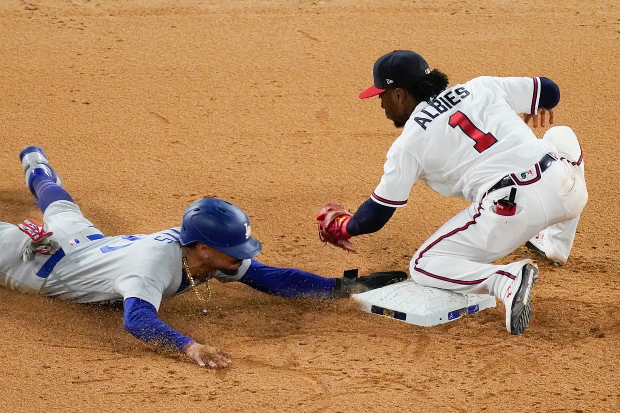 Los Dodgers se mantienen con vida tras vencer 7-3 a los Atlanta Braves en el quinto juego de la serie por el campeonato de la Liga Nacional.