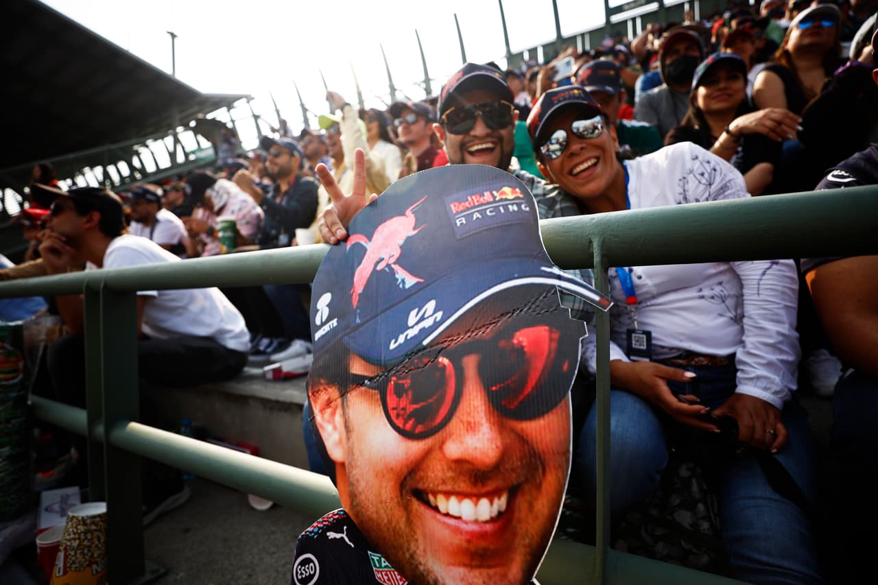 MEXICO CITY, MEXICO - OCTOBER 29: Sergio Perez of Mexico and Oracle Red Bull Racing fans show their support during qualifying ahead of the F1 Grand Prix of Mexico at Autodromo Hermanos Rodriguez on October 29, 2022 in Mexico City, Mexico. (Photo by Chris Graythen/Getty Images)