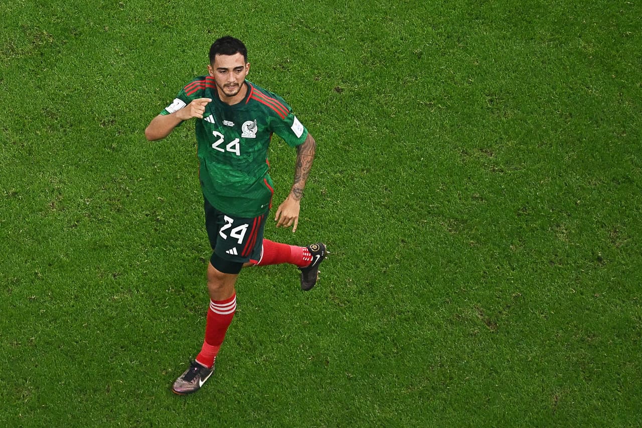 Mexico's midfielder #24 Luis Chavez celebrates scoring his team's second goal from a free-kick during the Qatar 2022 World Cup Group C football match between Saudi Arabia and Mexico at the Lusail Stadium in Lusail, north of Doha on November 30, 2022. (Photo by MANAN VATSYAYANA / AFP) (Photo by MANAN VATSYAYANA/AFP via Getty Images)