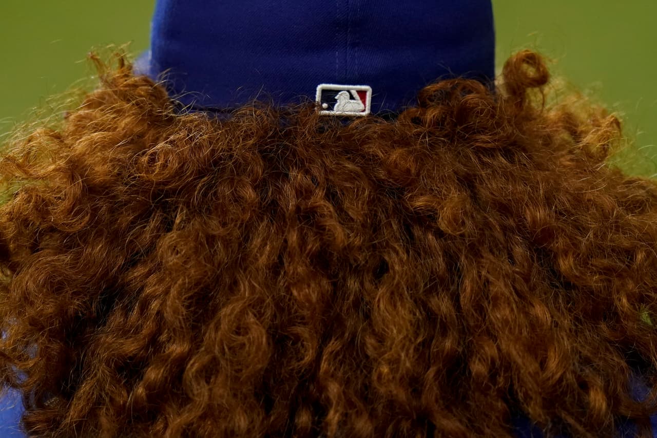 Los Dodgers se mantienen con vida tras vencer 7-3 a los Atlanta Braves en el quinto juego de la serie por el campeonato de la Liga Nacional.