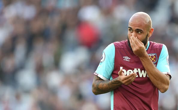 LONDON, ENGLAND - OCTOBER 01: West Ham United's Simone Zaza after getting a knock in the face during the Premier League match between West Ham United and Middlesbrough at Olympic Stadium on October 1, 2016 in London, England. (Photo by Rob Newell - CameraSport/CameraSport via Getty Images)