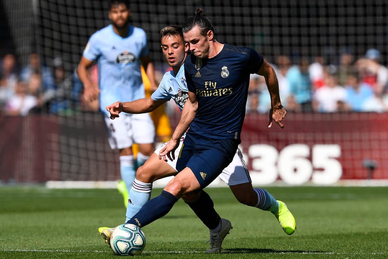 El Real Madrid venció 3-1 al Celta de Vigo con buena actuación de Bale y Benzema. Modric fue expulsado al 56'.