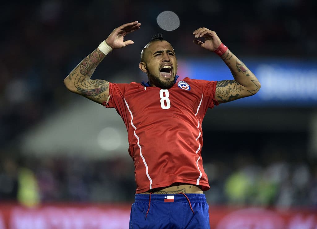 Chile's midfielder Arturo Vidal celebrates after scoring against Argentina during the penalty shootout of the 2015 Copa America football championship final, in Santiago, Chile, on July 4, 2015. AFP PHOTO / JUAN MABROMATA (Photo credit should read JUAN MABROMATA/AFP via Getty Images)