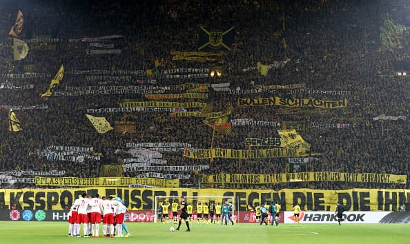 DORTMUND, GERMANY - FEBRUARY 04: Supporters of Dortmund display banners prior to the Bundesliga match between Borussia Dortmund and RB Leipzig at Signal Iduna Park on February 4, 2017 in Dortmund, Germany. (Photo by Lars Baron/Bongarts/Getty Images)