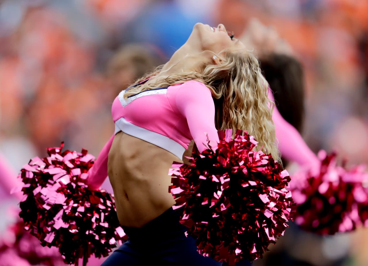 The Denver Broncos cheerleaders perform during the first half of an NFL football game against the Atlanta Falcons, Sunday, Oct. 9, 2016, in Denver. (AP Photo/Jack Dempsey)