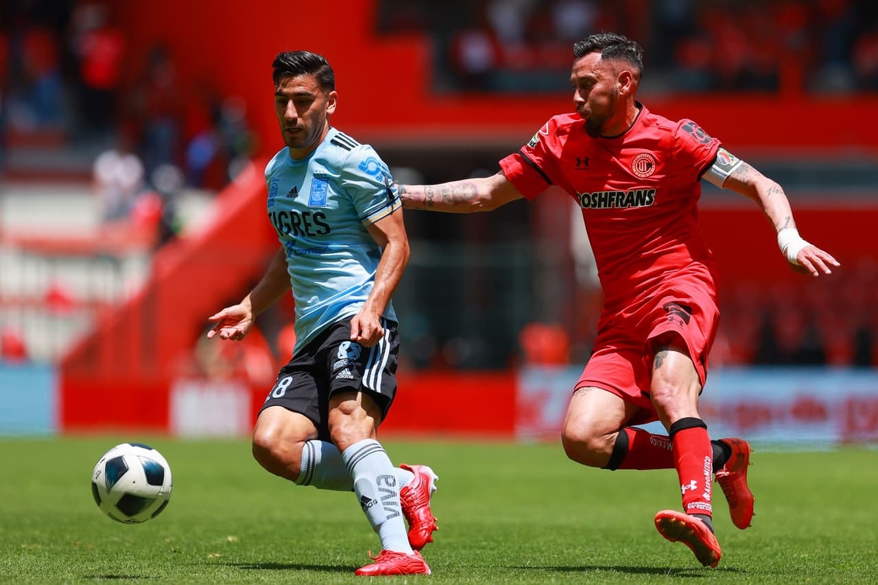 Toluca se impone en su casa ante Tigres 2-1 durante la segunda Jornada del Apertura 2021. Guido Pizarro abrió el marcador a los 27 minutos a favor de los de la UANL, pero Raúl López Gómez igualó el partido a los 33' y Alexis Canelo sumó gol para aventajar a los locales (84'). Fue Braian Zamudio quien sentenció el partido así los 'Diablos Rojos' suman tres puntos en el Grita México.