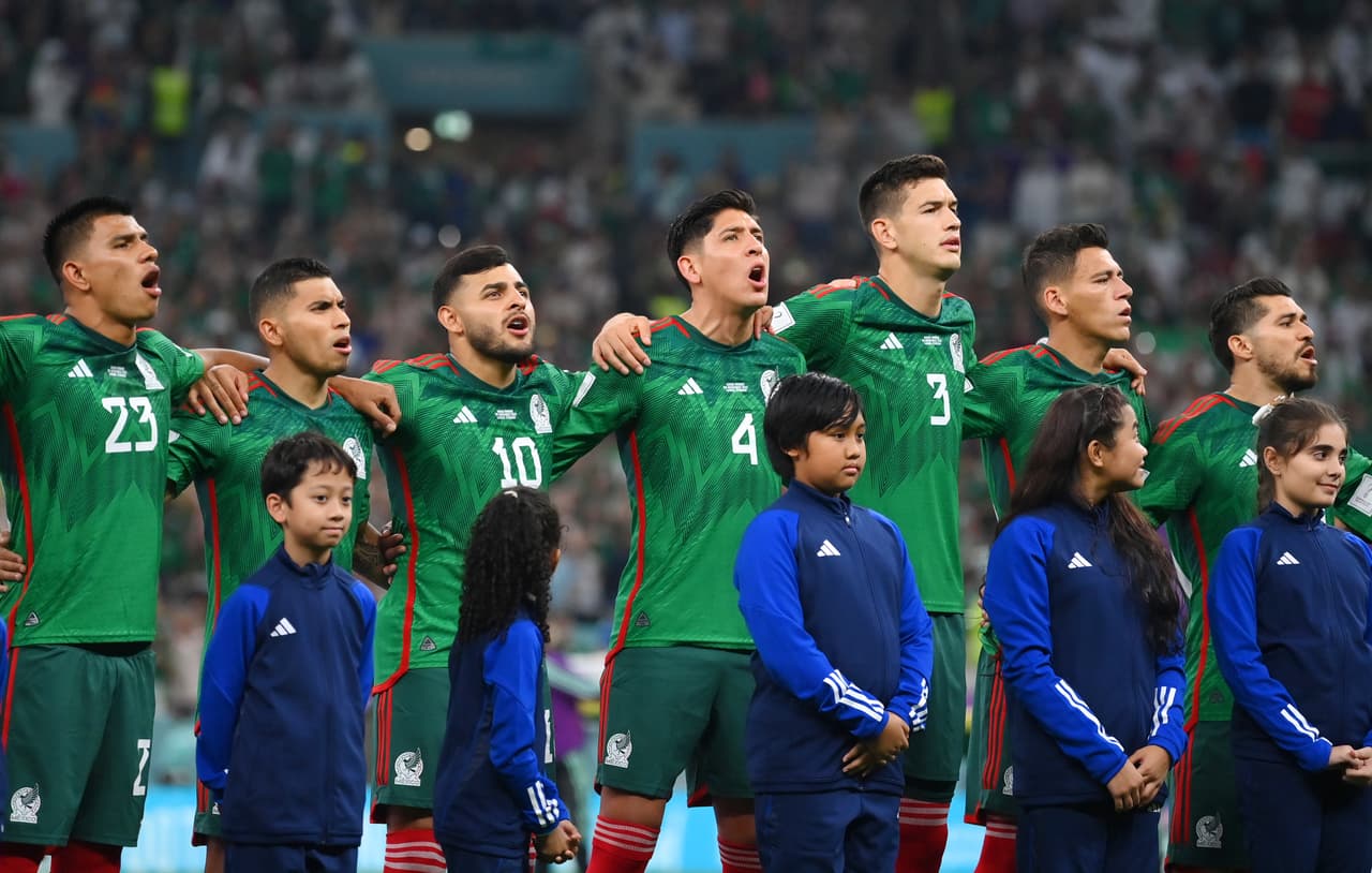 LUSAIL CITY, QATAR - NOVEMBER 30: Mexico players line up for the national anthem prior to the FIFA World Cup Qatar 2022 Group C match between Saudi Arabia and Mexico at Lusail Stadium on November 30, 2022 in Lusail City, Qatar. (Photo by Justin Setterfield/Getty Images)