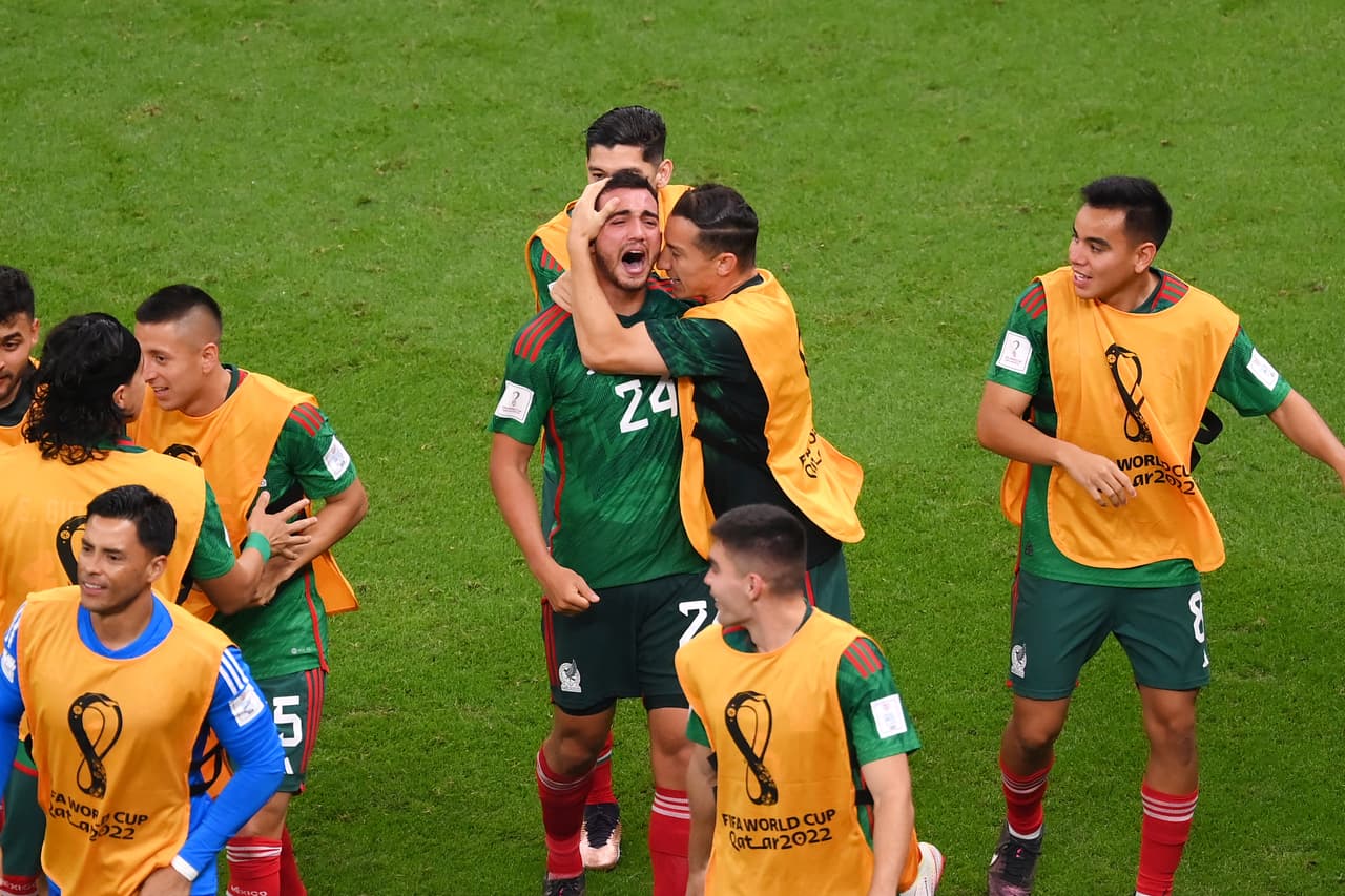 LUSAIL CITY, QATAR - NOVEMBER 30: Luis Chavez of Mexico celebrates with teammates after scoring their team's second goal during the FIFA World Cup Qatar 2022 Group C match between Saudi Arabia and Mexico at Lusail Stadium on November 30, 2022 in Lusail City, Qatar. (Photo by Laurence Griffiths/Getty Images)