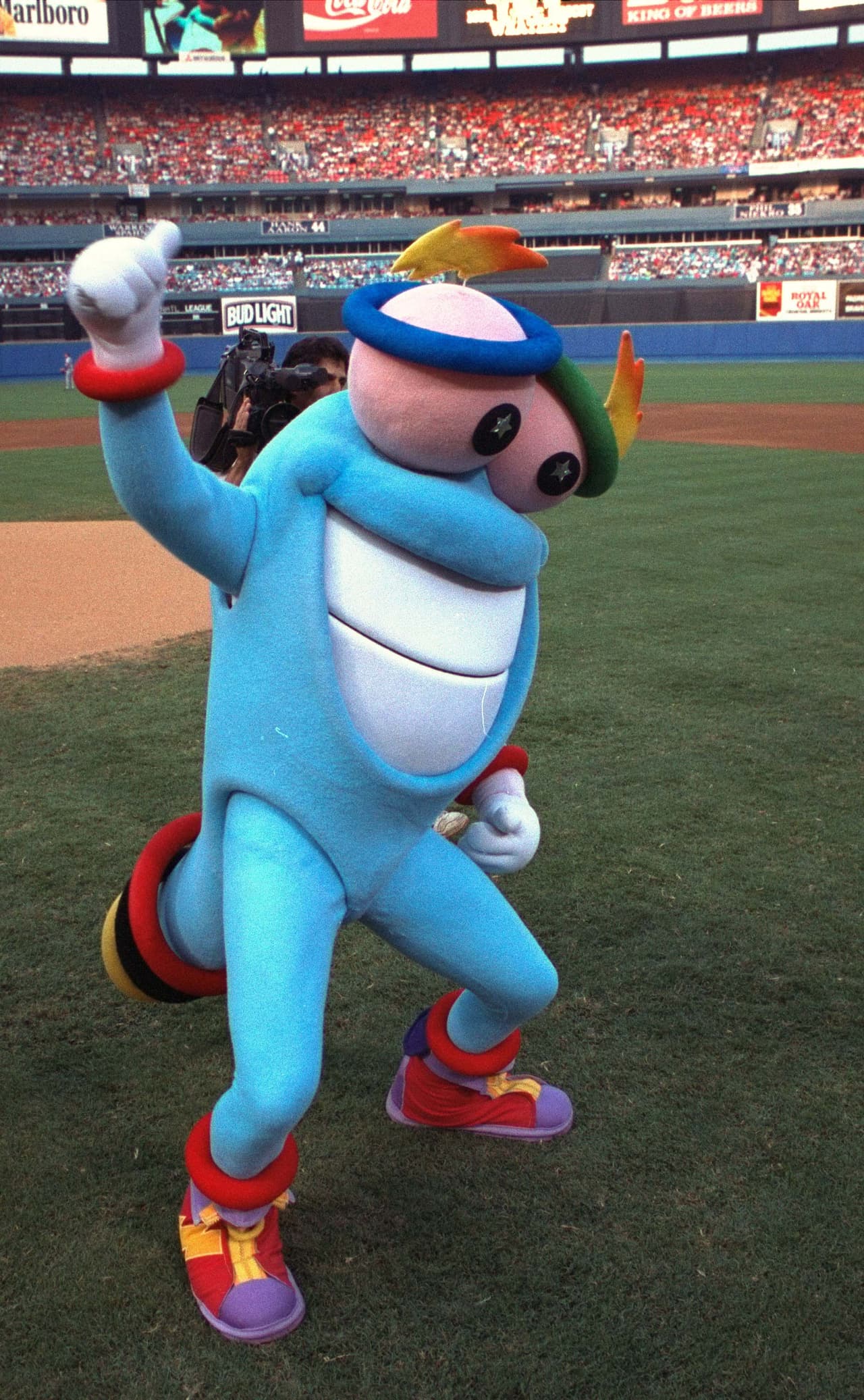 La mascota de los Juegos Olímpicos de Atlanta 1996 fue conocida en principio con Whatizit (que sería traducción de "qué es esto), y era una figura que se podía transformar en cualquier objeto.